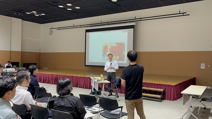 アステ会場での文部科学省田村学主任視学官の講演の様子